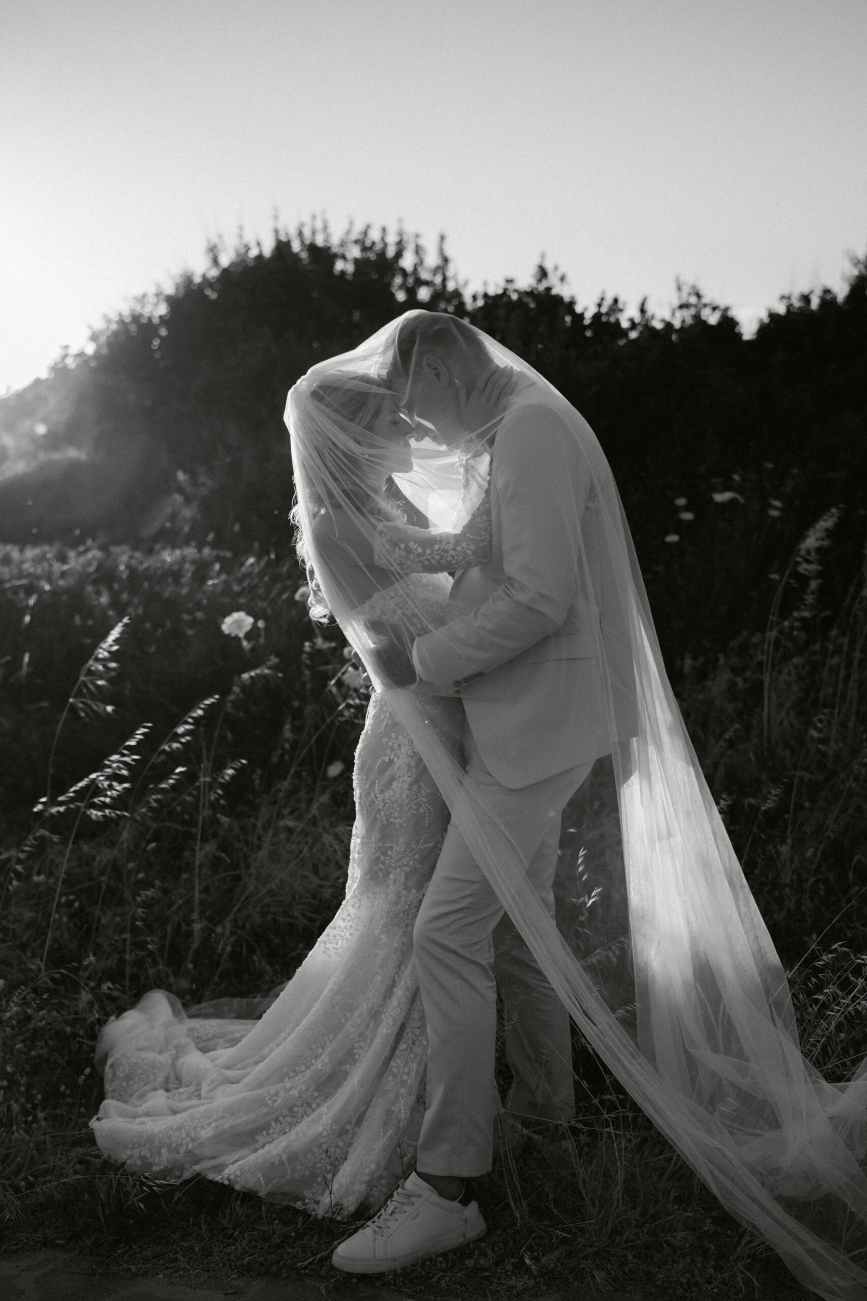 A couple embracing, in black and white
